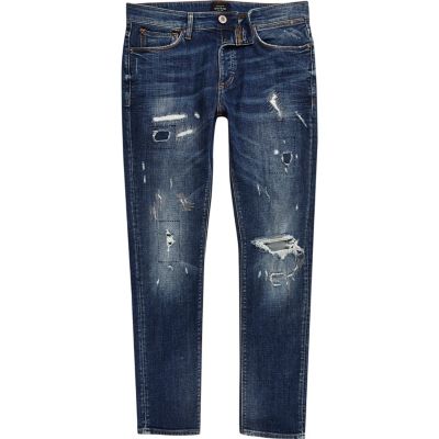 Mid blue ripped skinny Sid jeans